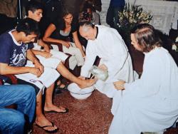 Bergoglio washes feet of the young.JPG